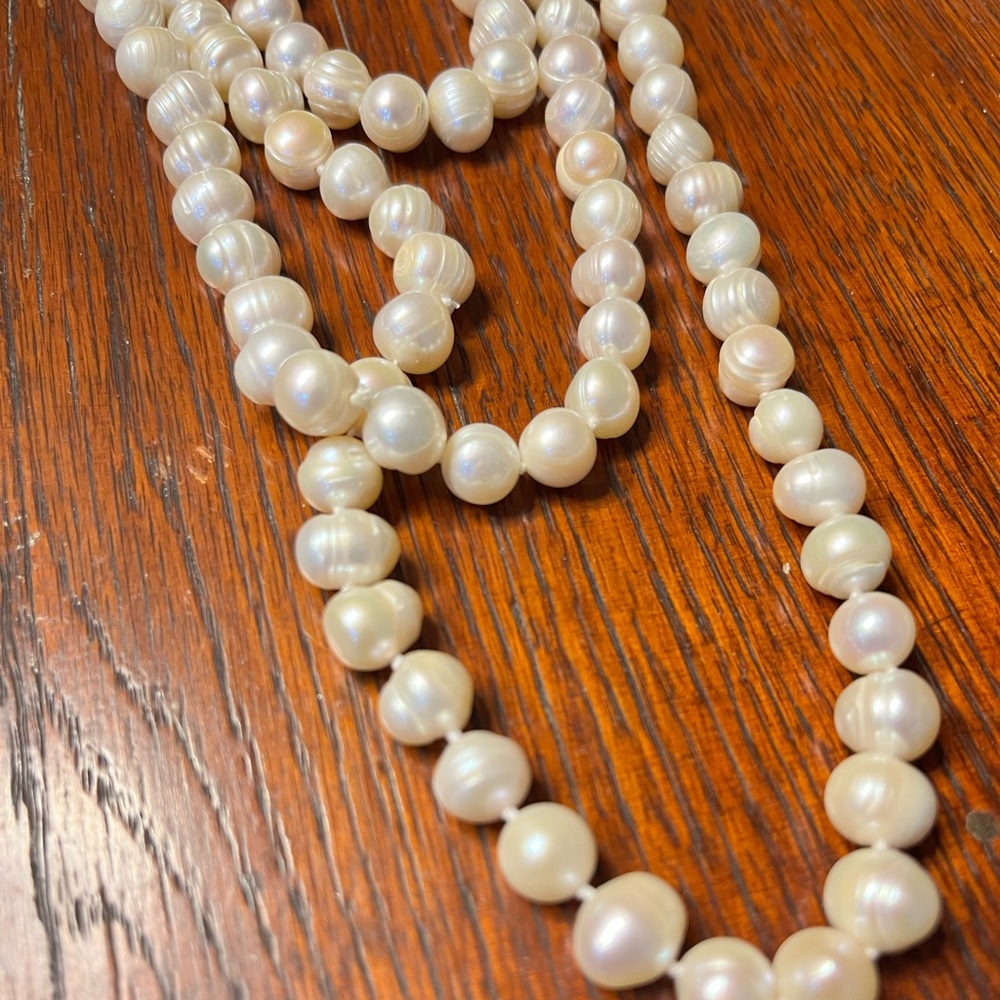 Gorgeous Fresh water pearl necklace 102”. Individually tied.